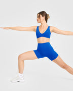 SoftMotion™ Scoop Back Bralette with White Logo | Light Cobalt Blue