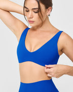 SoftMotion™ Scoop Back Bralette with White Logo | Light Cobalt Blue